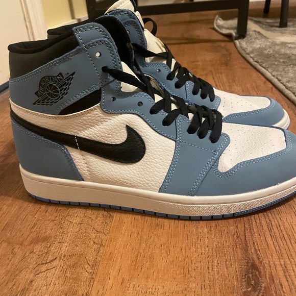 Nike Air Jordan Retro 1 High OG in White/Black/University Blue. main image 4